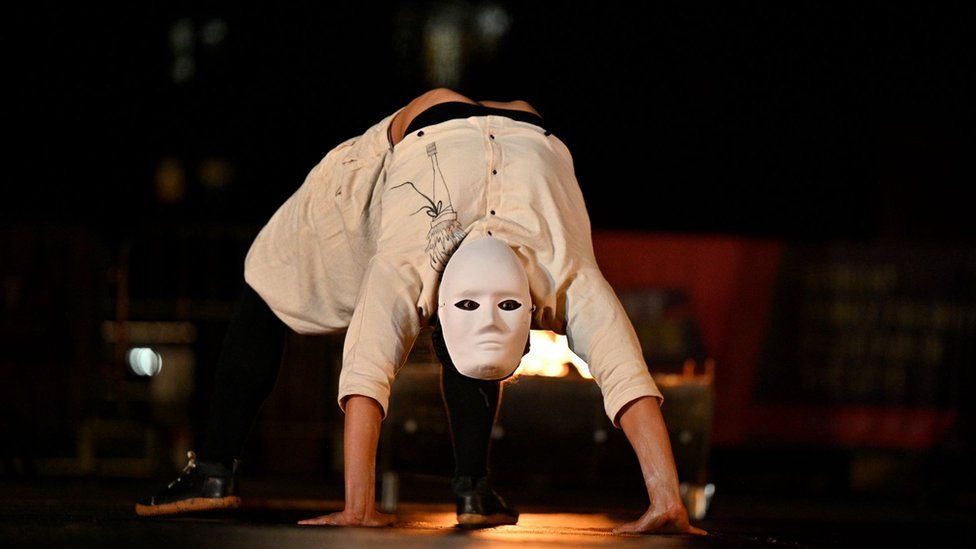 Performer in mask