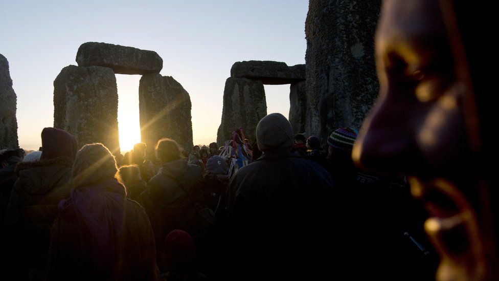 Pagan revellers celebrate the winter solstice at Stonehenge in Wiltshire in southern England on 21 December 2012