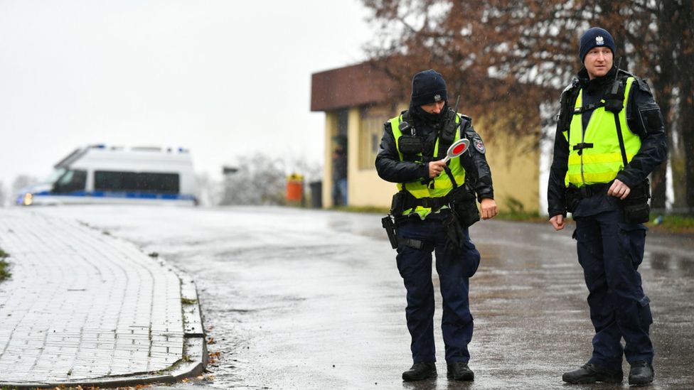 Polish police stand guard at site of missile blast