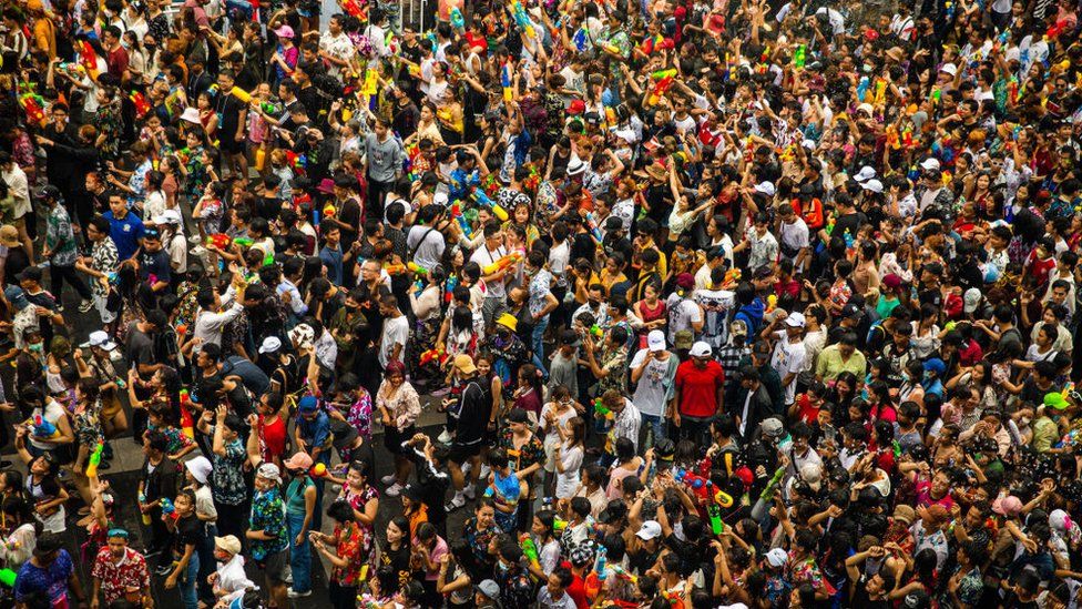 A large group of people celebrating Songkran