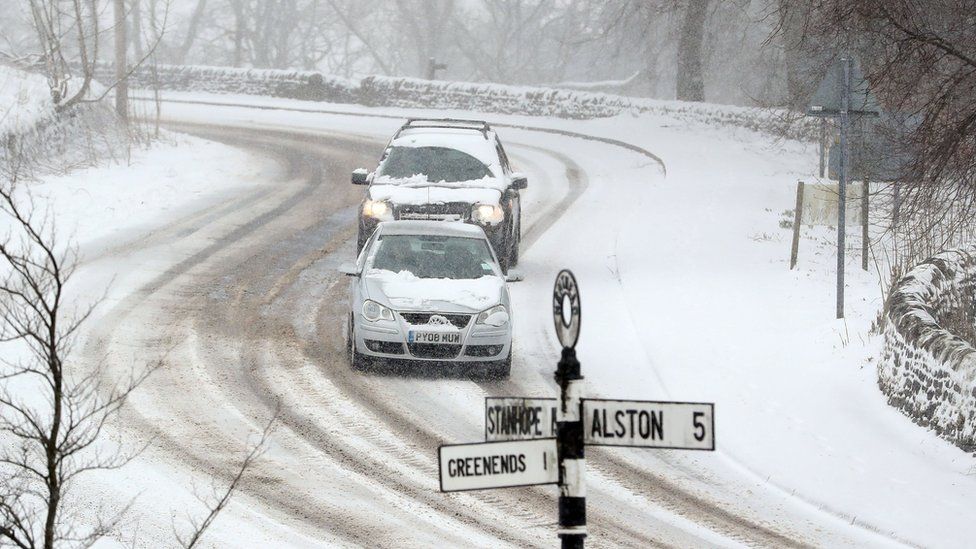 Drivers in the snow at Nenthead, Cumbria