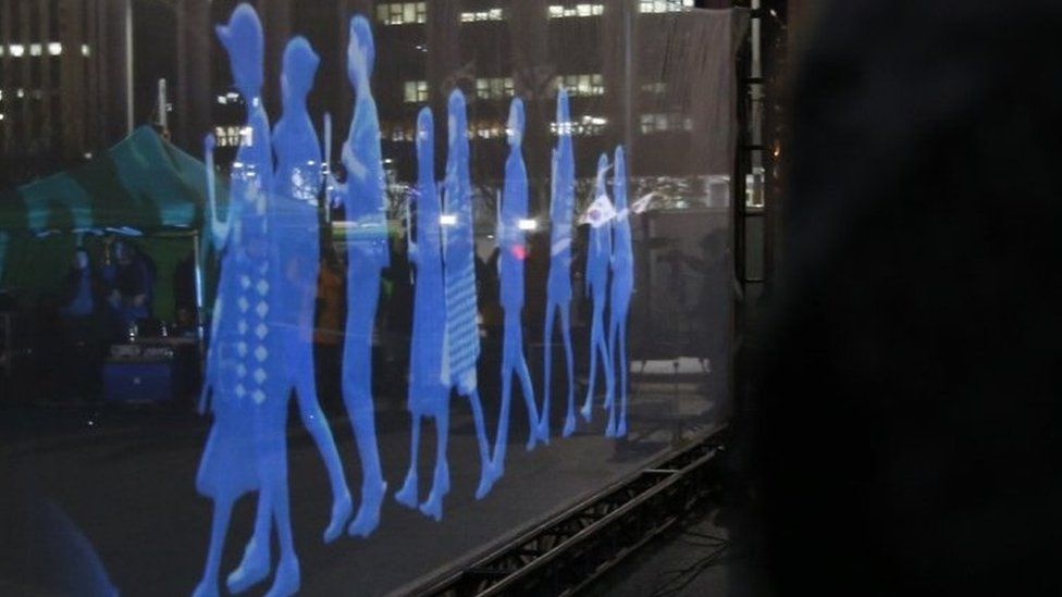 Holograms of protesters in Seoul. Photo: 24 February 2016