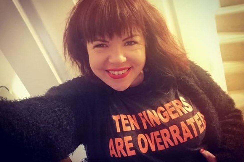 Briony Williams wearing a t-shirt with the slogan 'Ten fingers are overrated'
