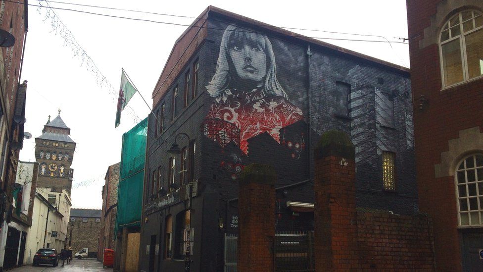 Artwork featuring musician Gwenno, outside Clwb Ifor Bach in Cardiff