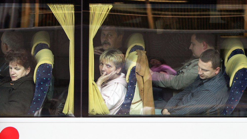 Polish migrants on bus leaving London, 20 May 09