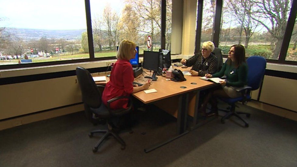 Three support workers in the Gwent police HQ