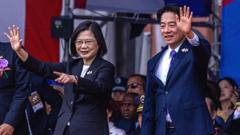 President Tsai Ing-wen (L) and Taiwanese vice-president and presidential hopeful William Lai (R) wave at the performers during Taiwan National Day on October 10, 2023 in Taipei, Taiwan.