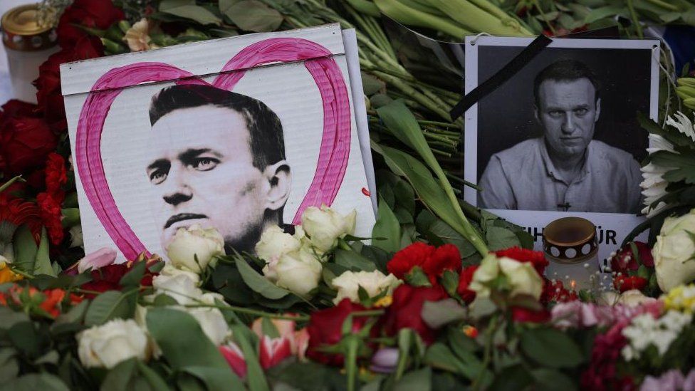 Tributes to Navalny laid outside the Russian embassy in the German capital, Berlin