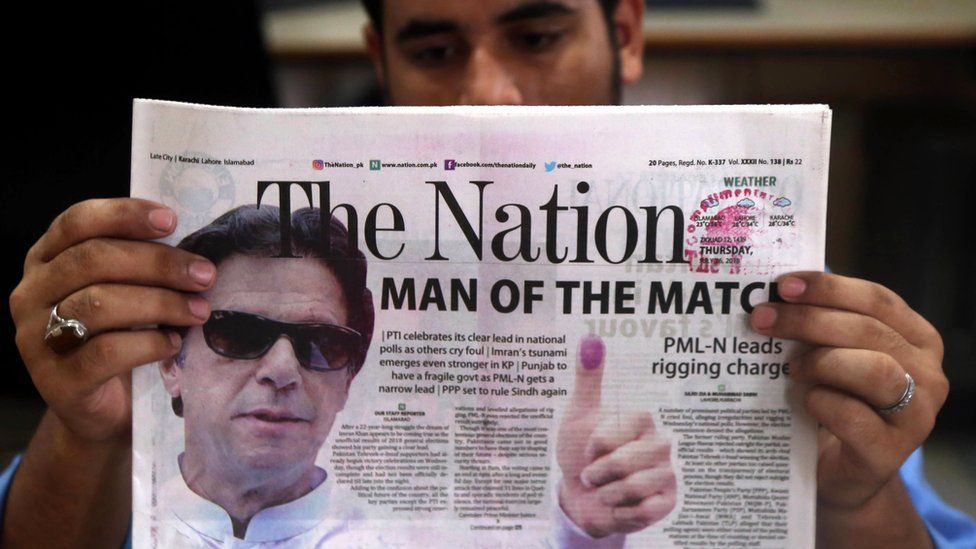 A Pakistani newspaper with a picture of Imran Khan, head of Pakistan Tehrik-e-Insaf (PTI) political party, a day after general elections in Karachi, Pakistan, 26 July 2018