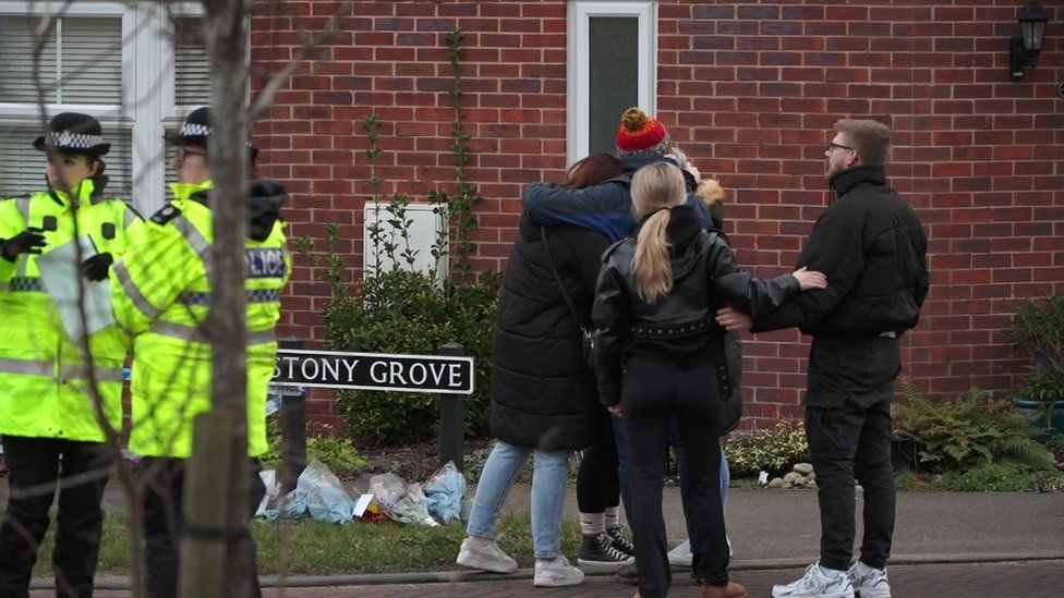 People paying respects following death of family in Costessey, near Norwich