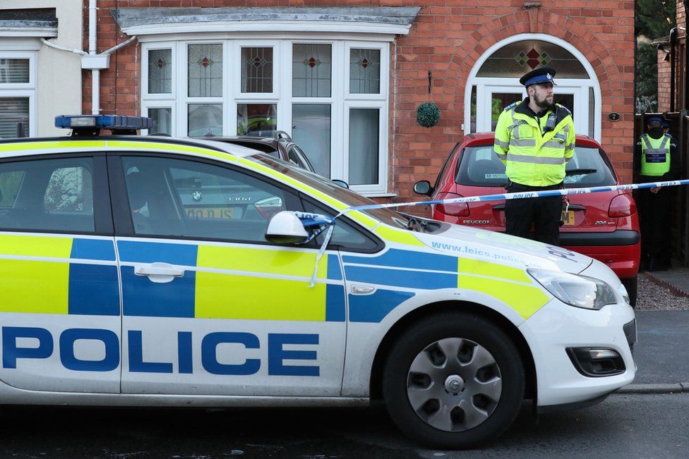 Police outside a house in Welwyn Road, Hinckley, where two children and a man were found dead, on 2 November 2016