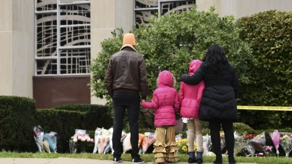 People at a memorial at the synagogue in Pittsburgh