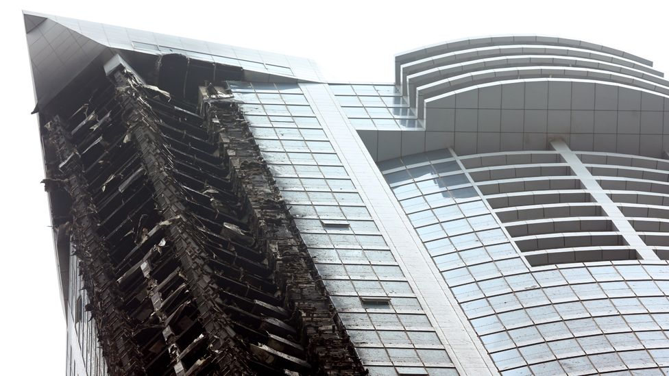 Damage to the Torch Tower is pictured after a fire engulfed the residential skyscraper in the Dubai Marina pictured on February 21, 2015