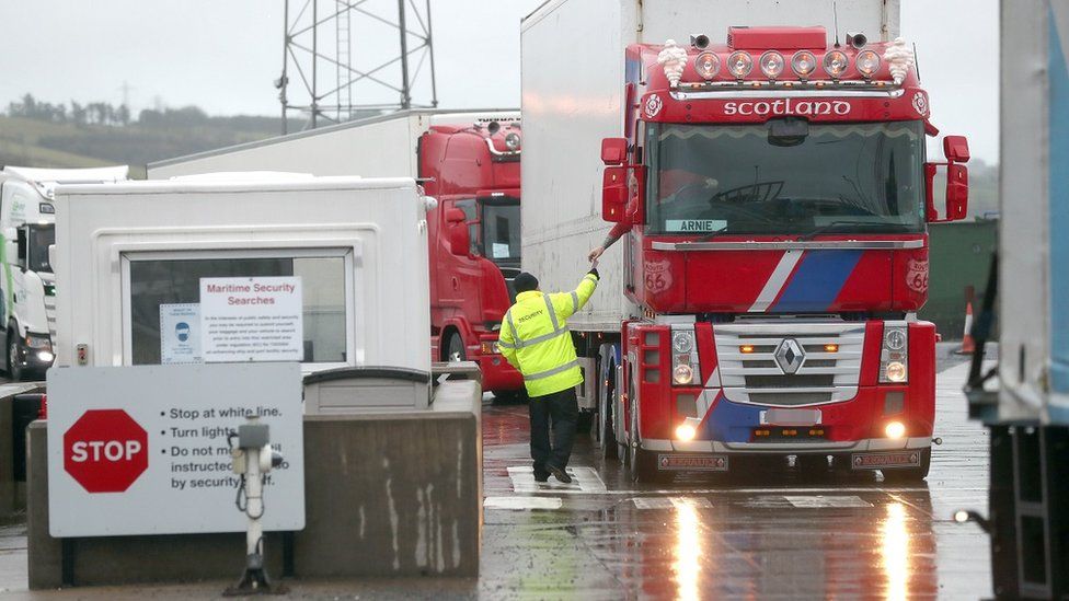A lorry goes through security at Larne port in County Antrim