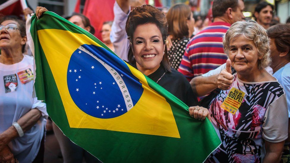Unionists and Worker"s Party (PT) supporters demonstrate in support of President Dilma Rousseff and former President Luiz Inacio Lula da Silva in Porto Alegre on March 31, 2016.