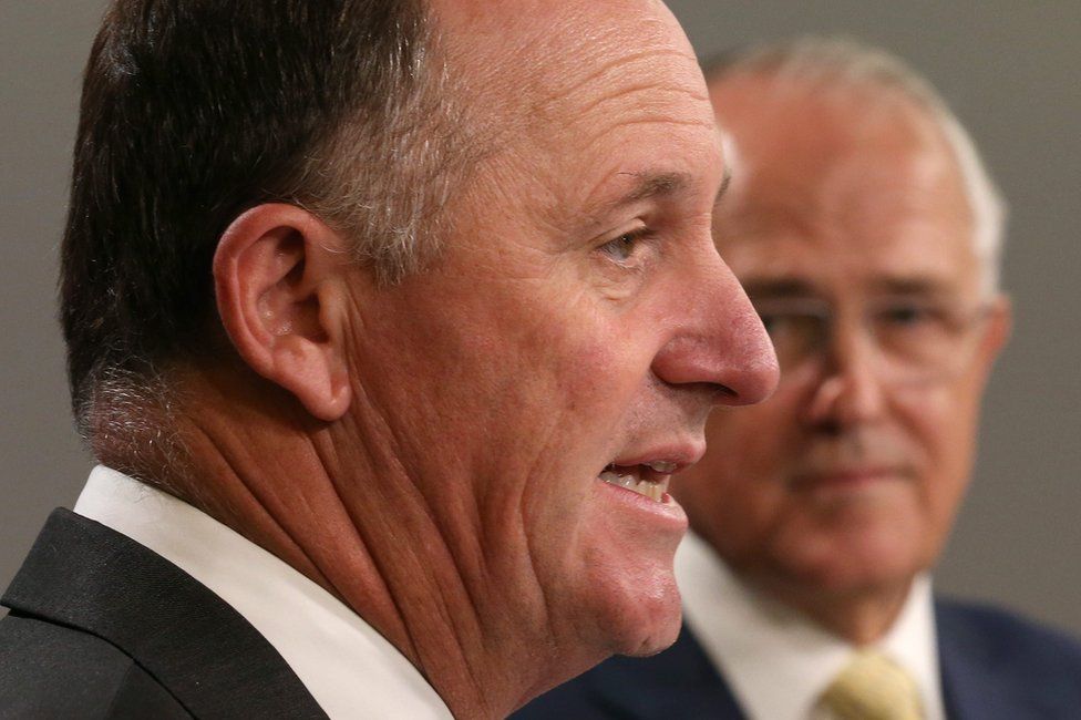 New Zealand Prime Minister John Key (foreground) speaking as Australian Prime Minister Malcolm Turnbull looks on at a media conference in Sydney, Australia. 19 February 2016.