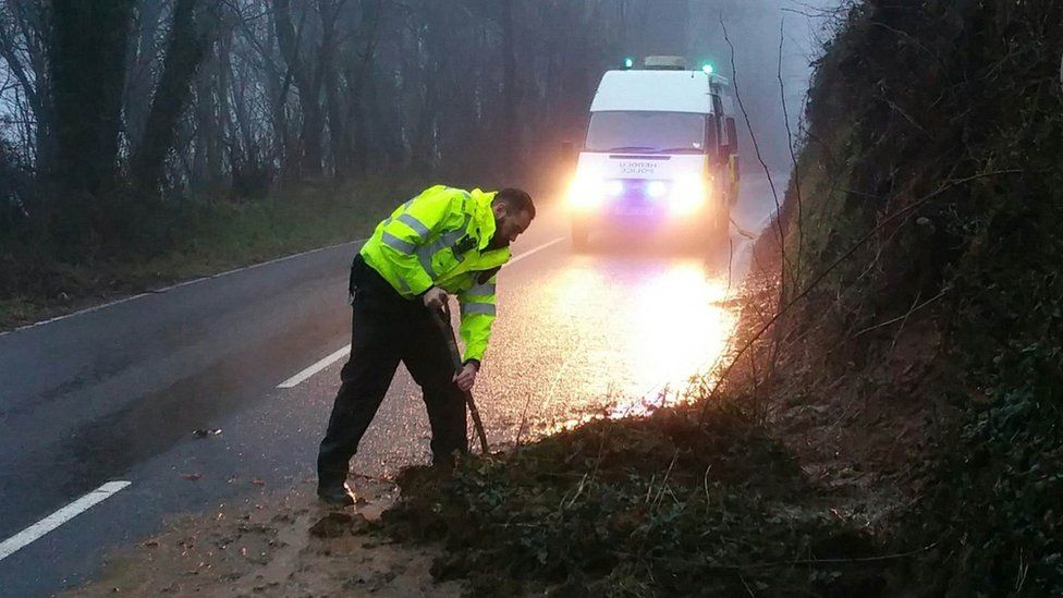 Police dealing with a landslip in Ceredigion