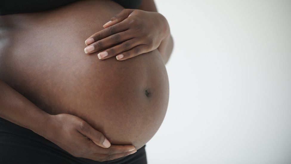 Беременная негритянка
