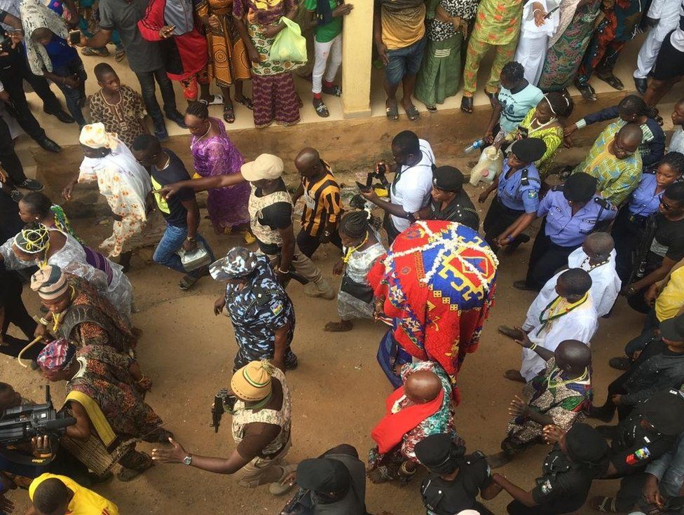 The devotees march in a procession