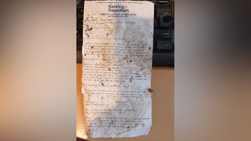 One of the damaged parking fines Mr Hawkins received
