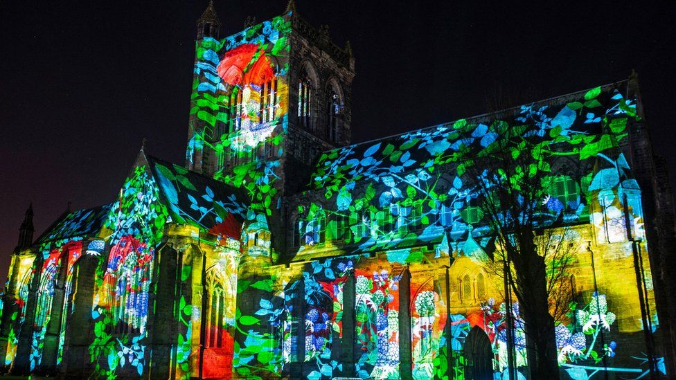 Paisley Abbey is illuminated during a photocall for an installation entitled 'About Us', created by 59 Productions, as part of the UNBOXED: Creativity in the UK event, in Paisley, Scotland on February 28, 2022