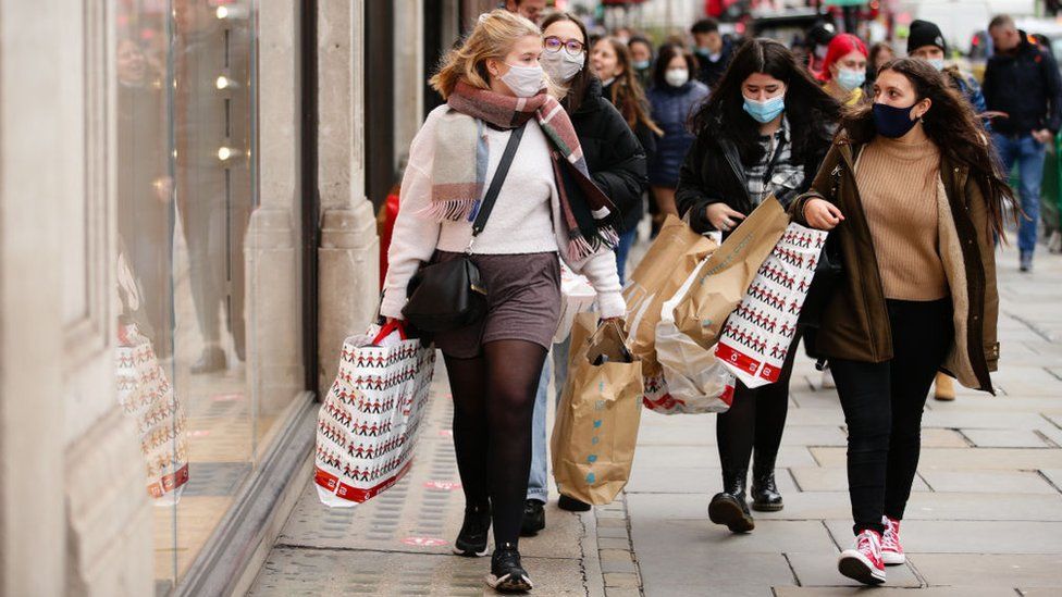 Christmas shoppers wearing face masks