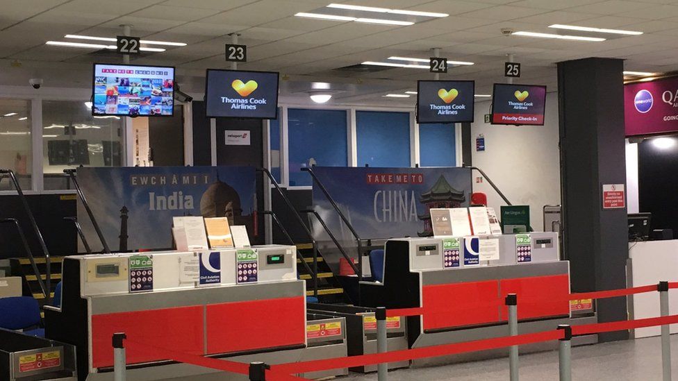 Closed Thomas Cook check-in desk at Cardiff airport
