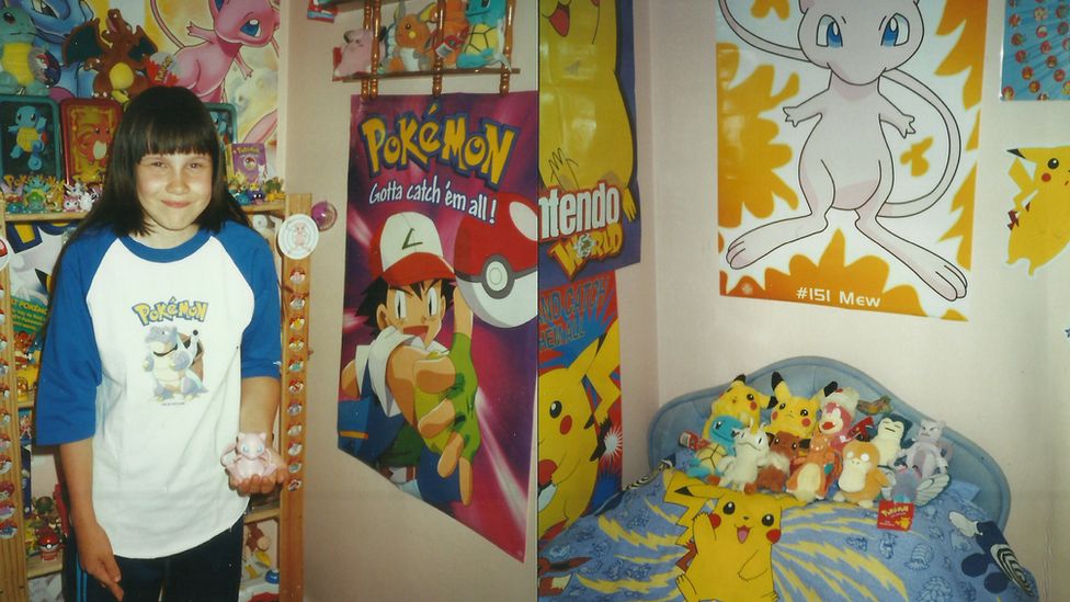 Lisa Courtney with Pokémon memorabilia