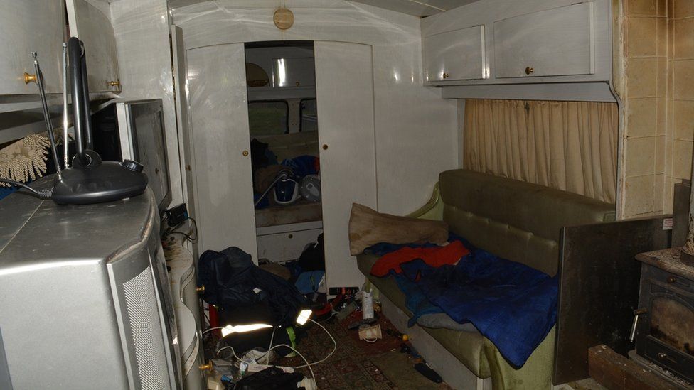 Mess and filth inside a caravan