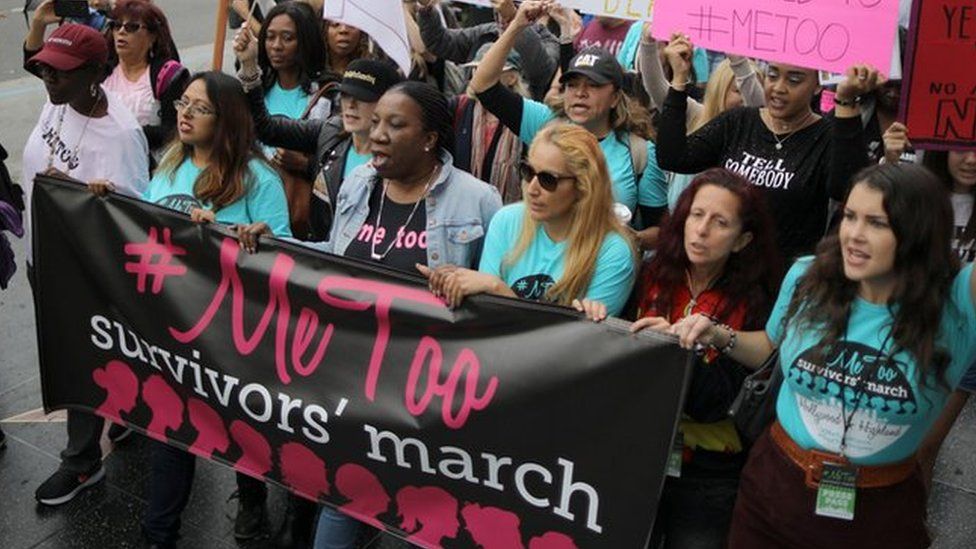 People participate in a protest march for survivors of sexual assault and their supporters on Hollywood Boulevard in Hollywood, Los Angeles, California U.S. November 12, 2017.