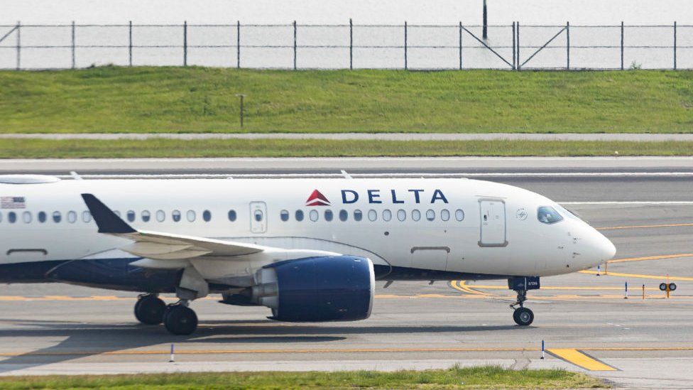 A Delta flight sits on the tarmac in New York in May 2023 (FILE)