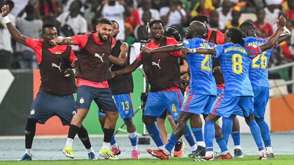 DR Congo players celebrate a goal against Guinea in the 2023 Africa Cup of Nations quarter-finals