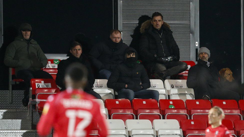 Gary Neville (top) watches Salford City at their Moor Lane stadium earlier in 2021