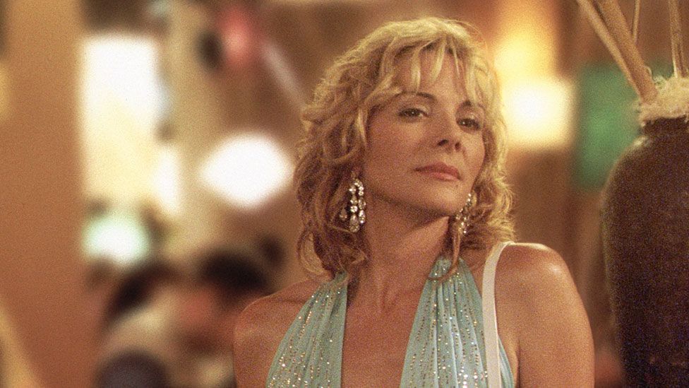 Kim Cattrall playing the role of Samantha Jones