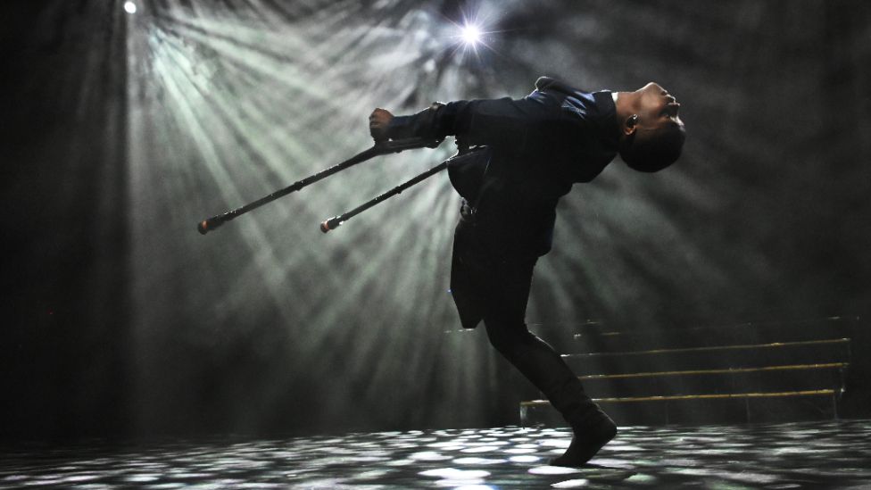 Dancer Musa Motha performs on crutches at the Golden Buzzers Celebration at Johannesburg Theatre in South Africa.
