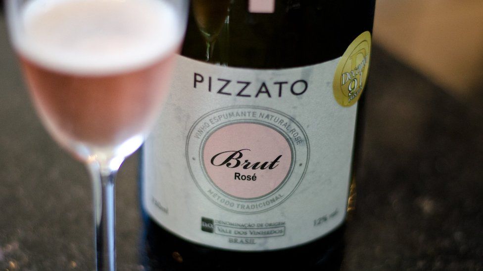 A glass of Pizzato rosé sparkling wine