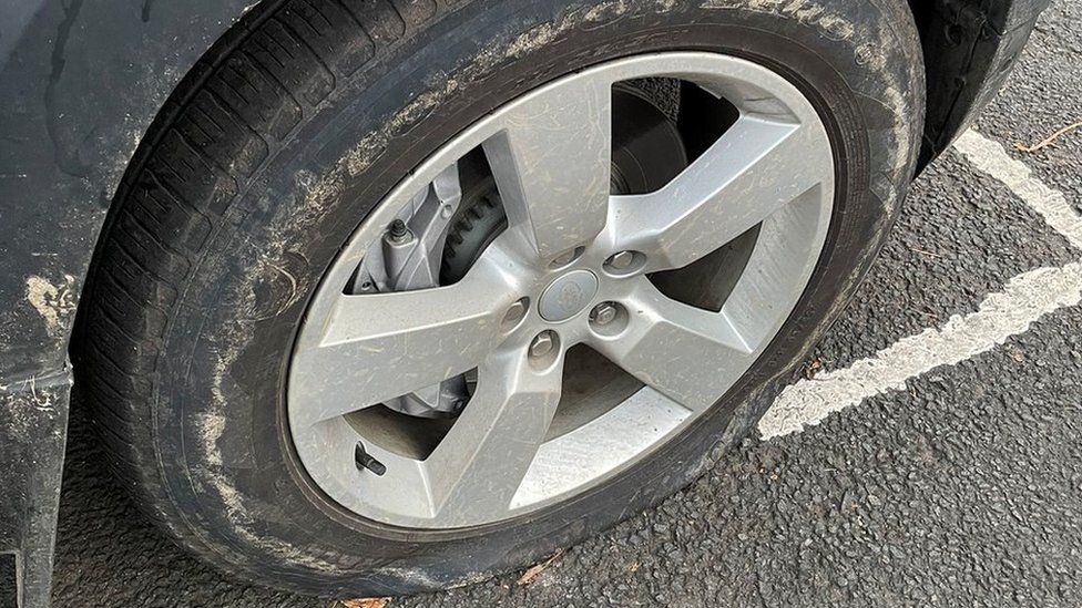 Activists deflate tyres on SUVs in Edinburgh BBC News