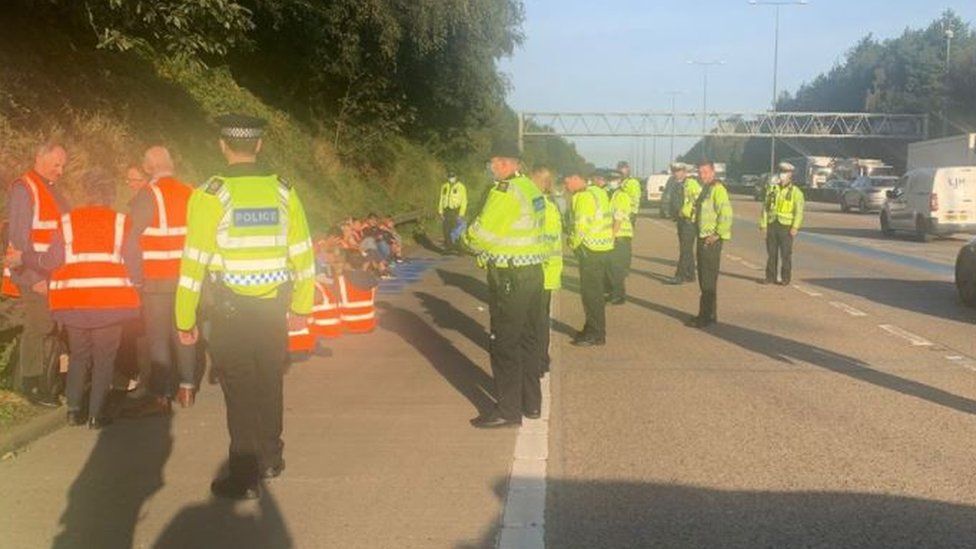 Police by the side of the M25