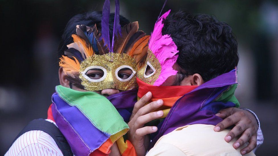 An Indian couple at a pride parade