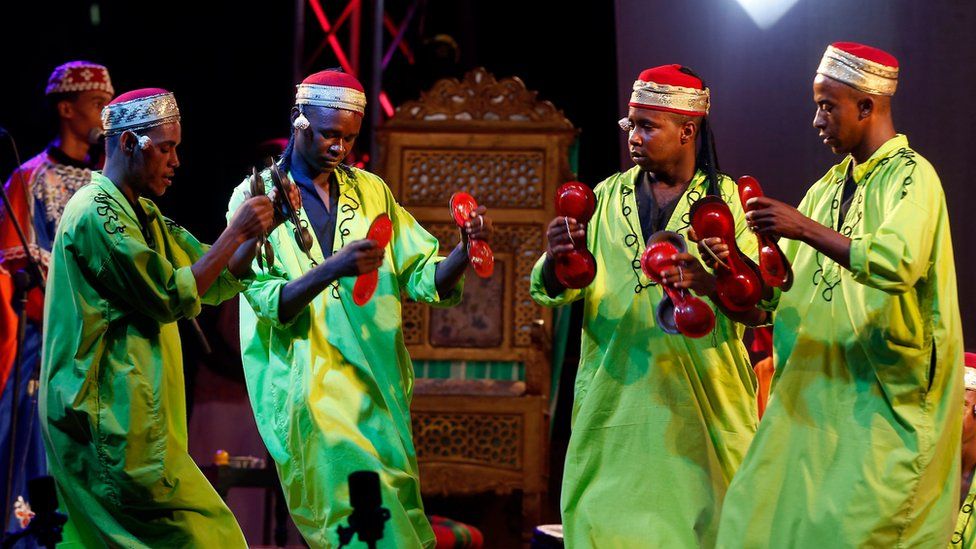 Members of the groups Diwan Ajam Stambali of Tunisia, Gnaoua of Morocco and Diwan of Algeria perform during the 53rd edition of the International Festival of Carthage at Carthage National Museum in Tunis, 31 August 2017