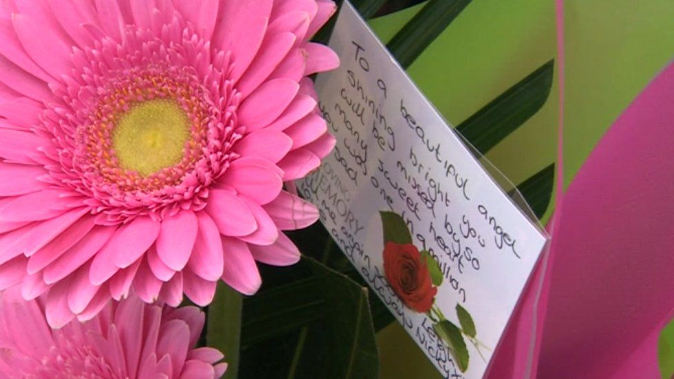Floral tributes have been left near the murder scene in Dinnington