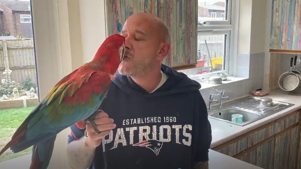 Peter Gosden and parrot