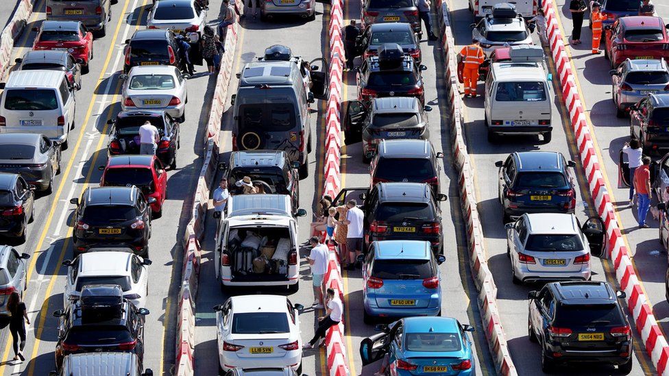 Passengers queue for ferries at the Port of Dover in Kent during the hot weather. Picture date: Saturday July 16, 2022.