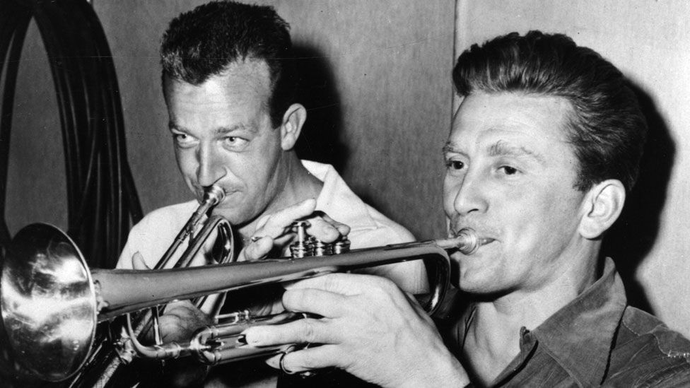 Kirk Douglas with trumpeter Harry James in 1950
