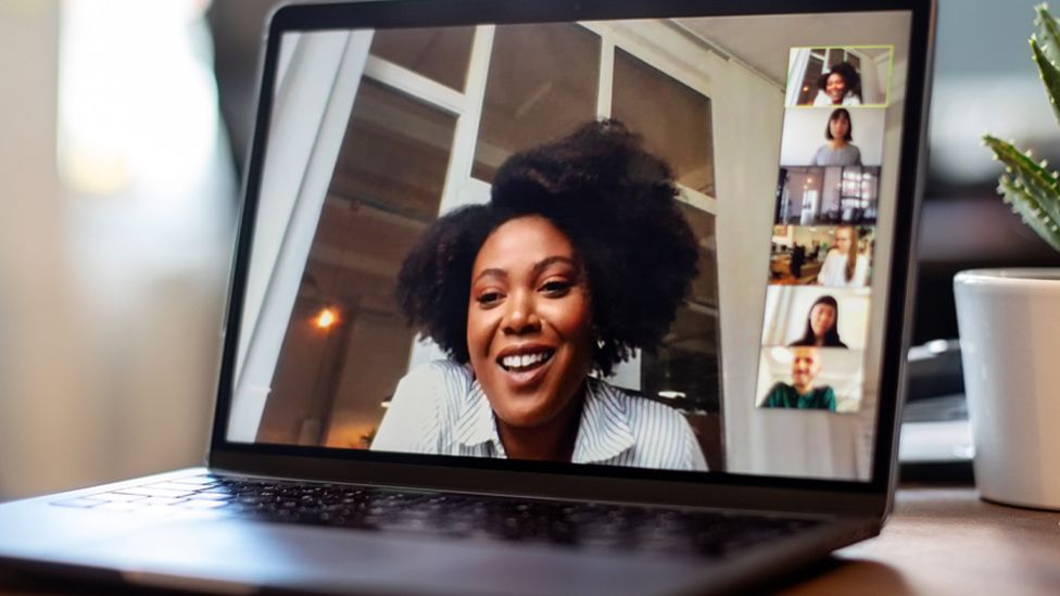 Woman on a computer screen during an online meeting.