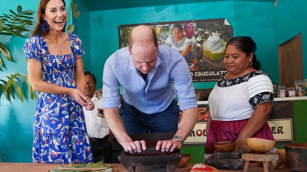 The Duke and Duchess of Cambridge ground cacao nibs on a visit to a family-run chocolate farm in southern Belize