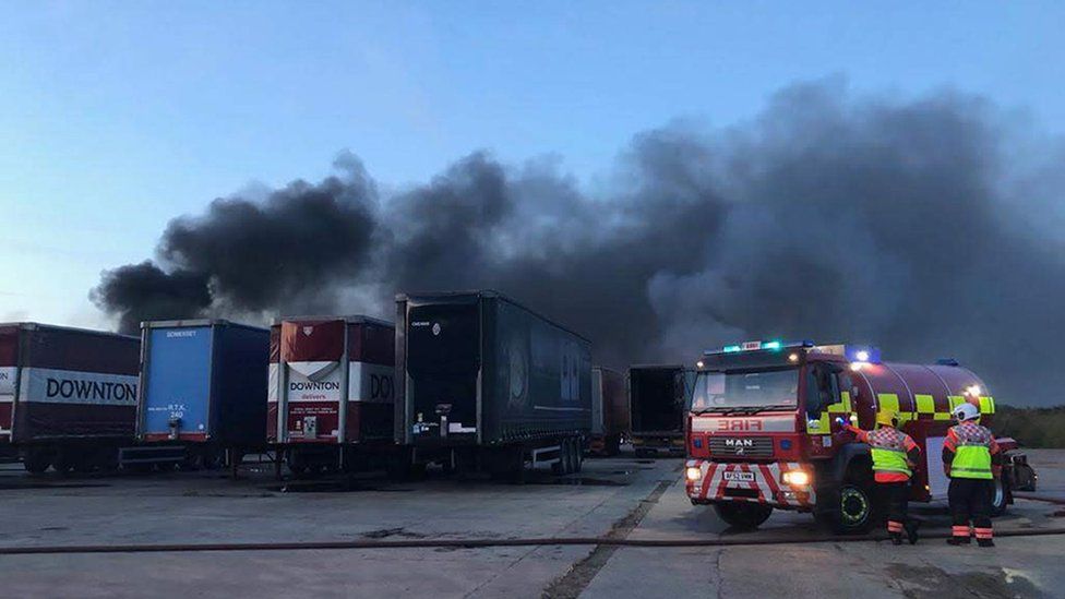 Peterborough fire: Trailers in blaze at Whirlpool HQ - BBC News