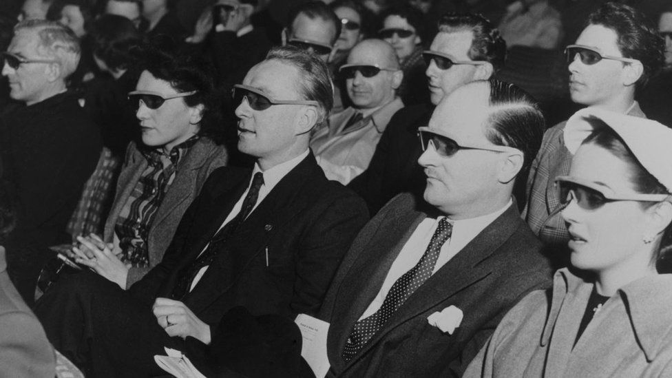 An audience wearing stereoscopic spectacles watching Telecinema, 1951