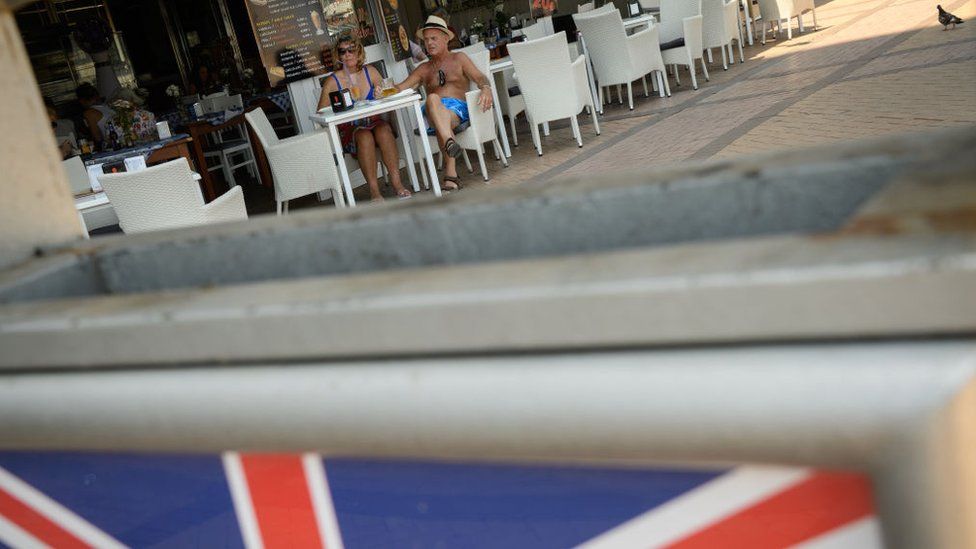 Union Jack in front of cafe in Spain