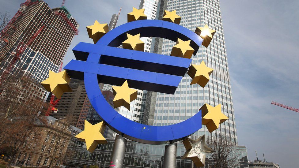 The Euro logo is seen in front of the European Central bank